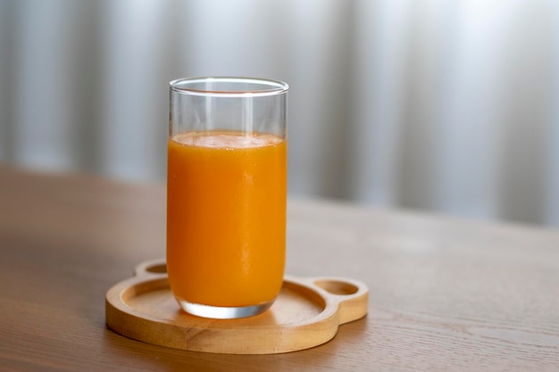 Close-up of beer glass on table