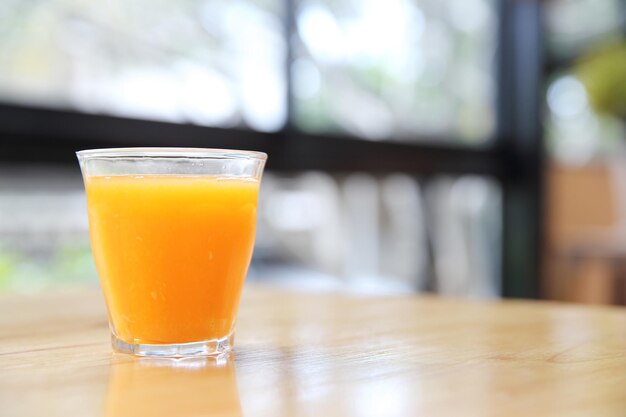 Close-up of beer glass on table