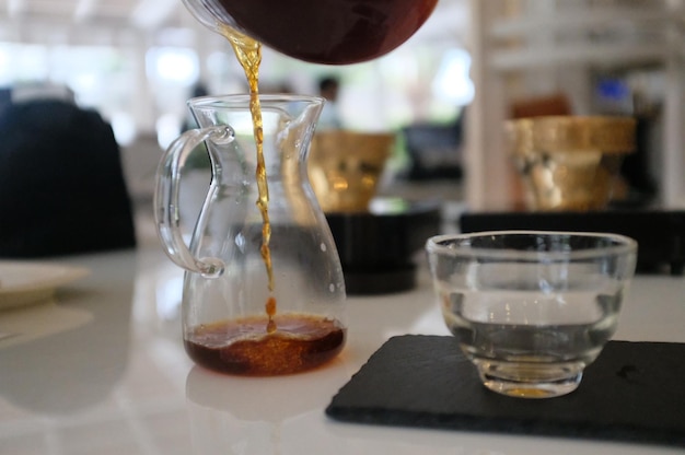 Close-up of beer glass on table