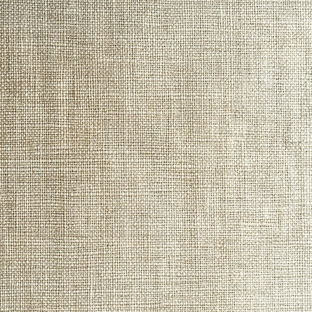 a close up of a beige and brown fabric with a textured background