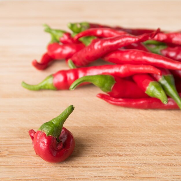 Close-up of bell peppers on wooden table