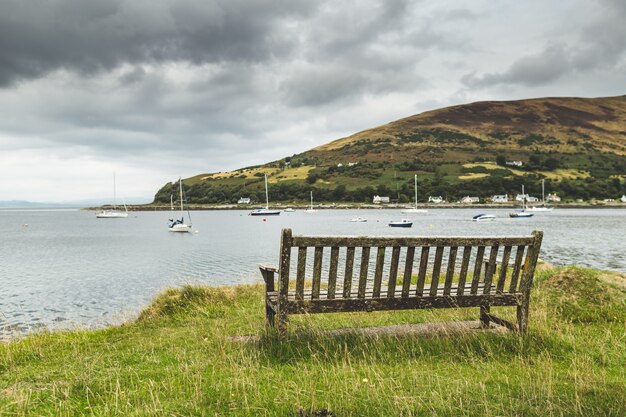 Close-up bench on the Scottish shore. The bayview.