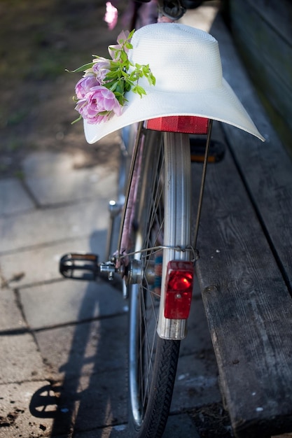 Close-up of bicycle on footpath by street