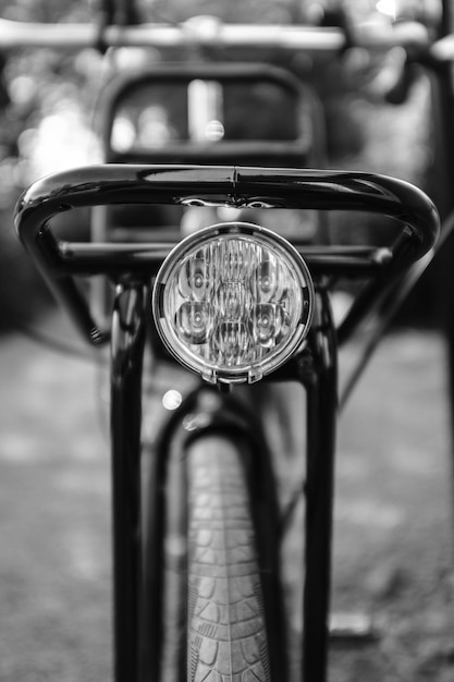 Photo close-up of bicycle taillight on street