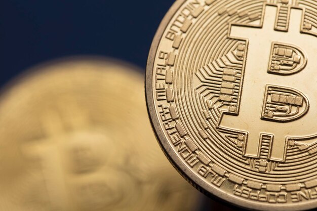 Close up of bitcoin cryptocurrency blockchain gold coins