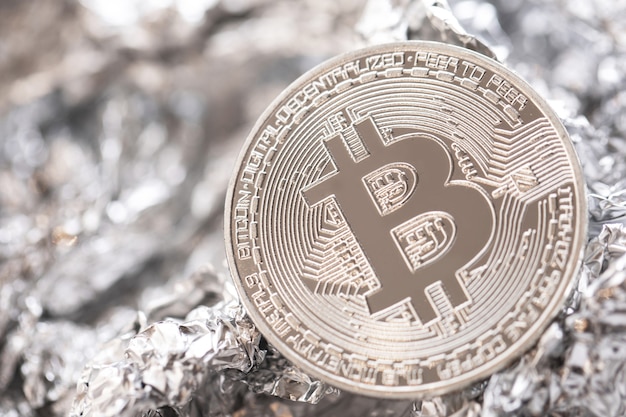 Close-up of bitcoin on the foil surface