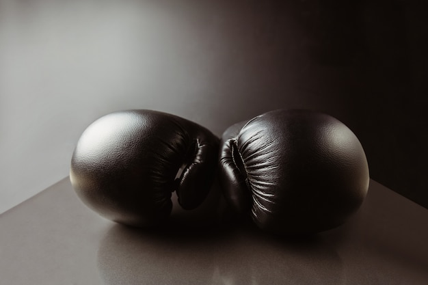 Close up of black boxing gloves