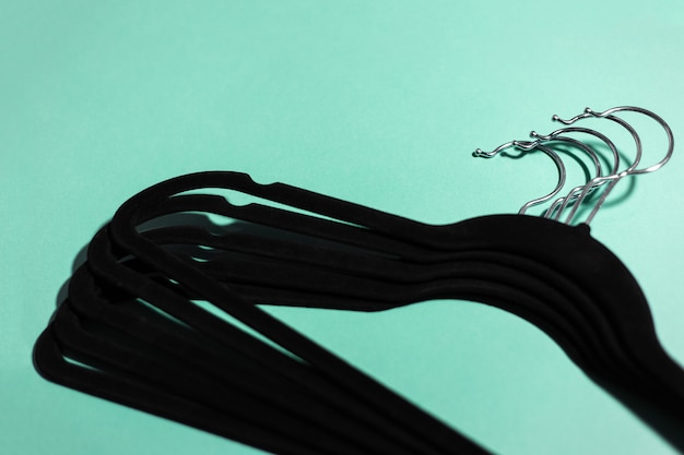 Close-up of black hangers for clothes