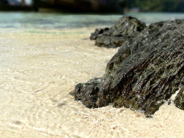 Close up of black stone on Railay beach