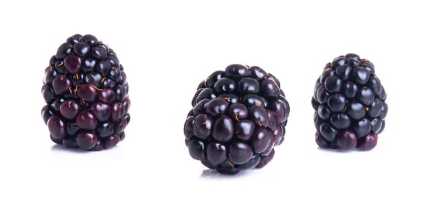 Close-up of blackberries against white background