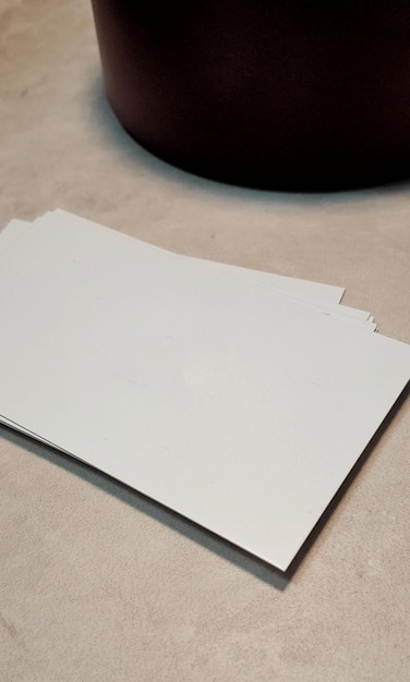 Close up of a block of blank business cards in white to customize with your own data Mock up