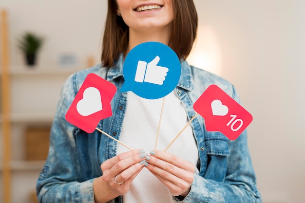 Photo close-up blogger holding social media flags