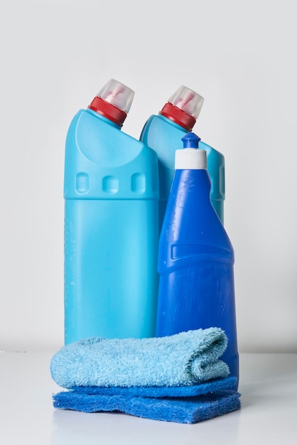 Close-up of blue bottles against white background