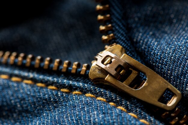 Close up blue jeans zipper.