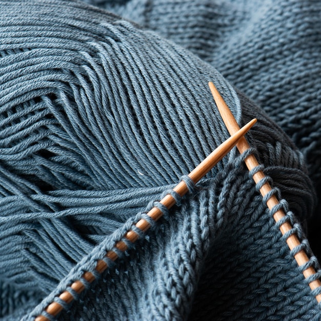 Close-up of blue knitting set