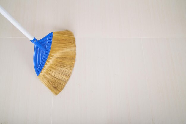 Close-up of blue paint on floor against white wall