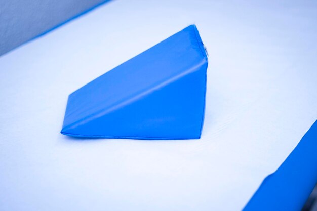 Close-up of blue paper against white background