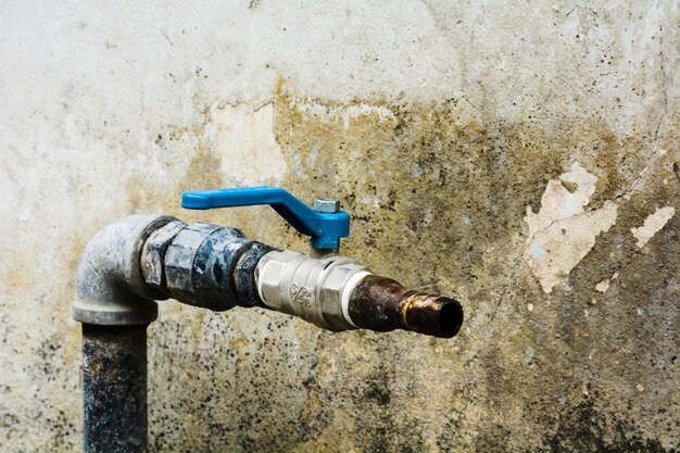 Close-up of blue pipe on wall