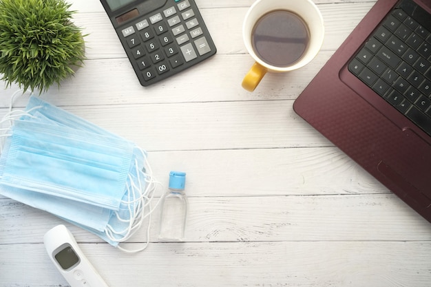 Close up of blue surgical masks on office deks