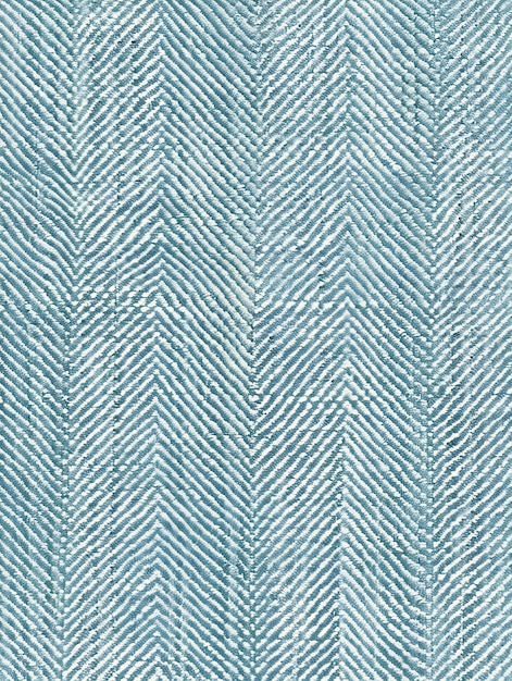 a close up of a blue and white fabric with a pattern of lines