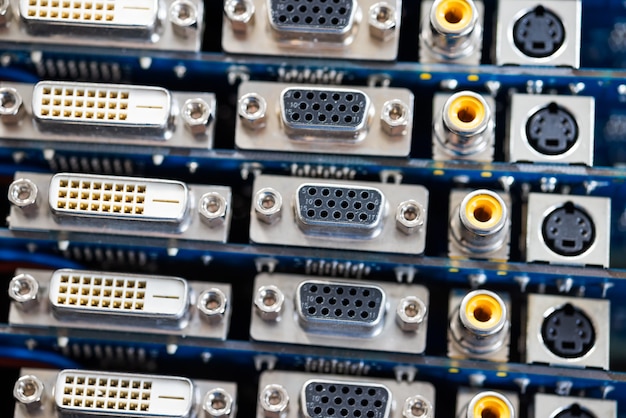 Close-up blurry metal sockets on a computer video board