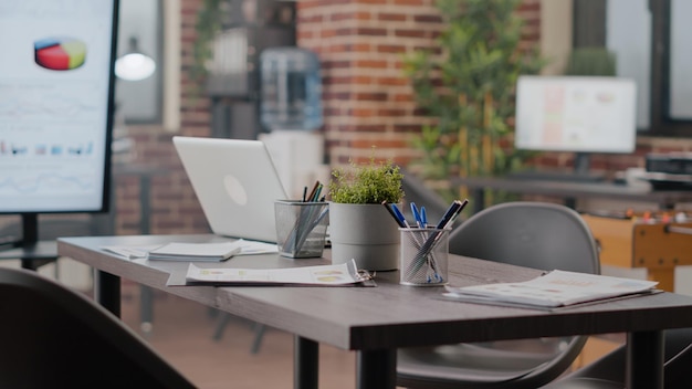 Close up of boardroom space used for business meeting to work on financial growth and development. Empty office decorated for briefing conference with data analysis presentation.