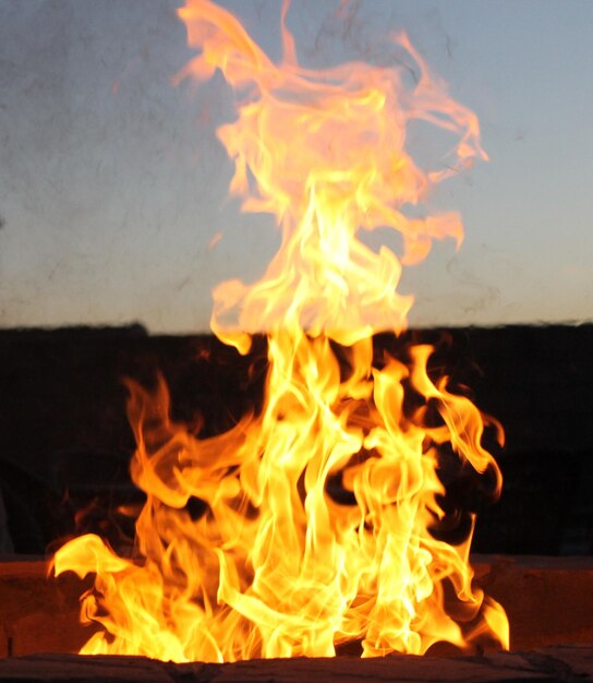 Close-up of bonfire at dusk