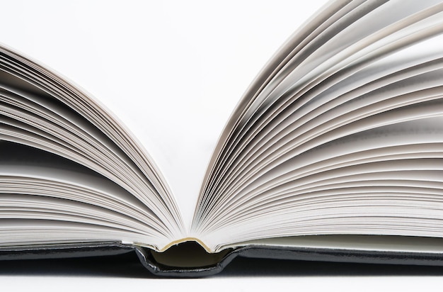 Close-up of book against white background