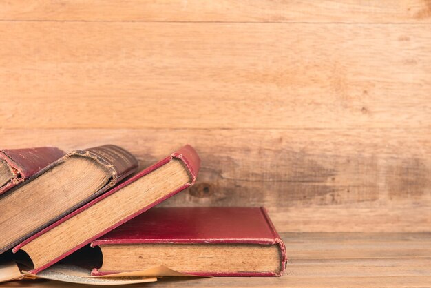 Close-up of books on wooden table