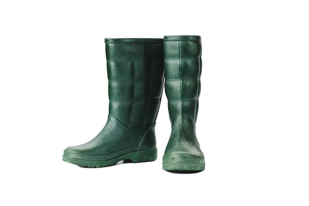 Close-up of boots against white background