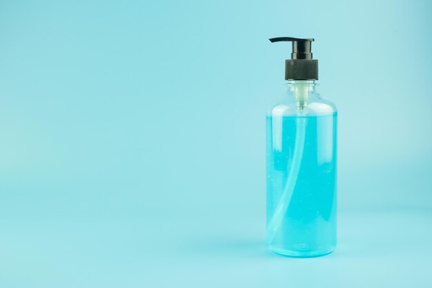 Close-up of bottle against blue background