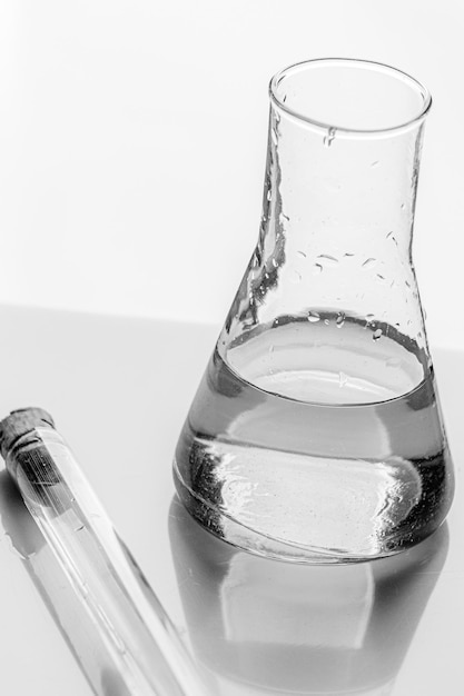 Photo close-up of bottles against white background