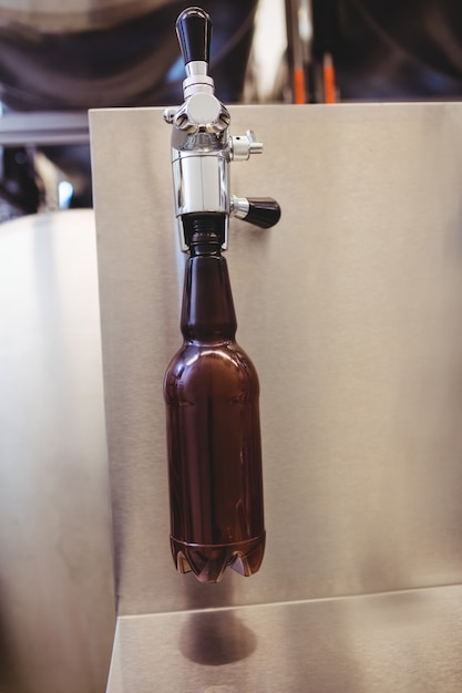 Close-up bottling plant in brewery