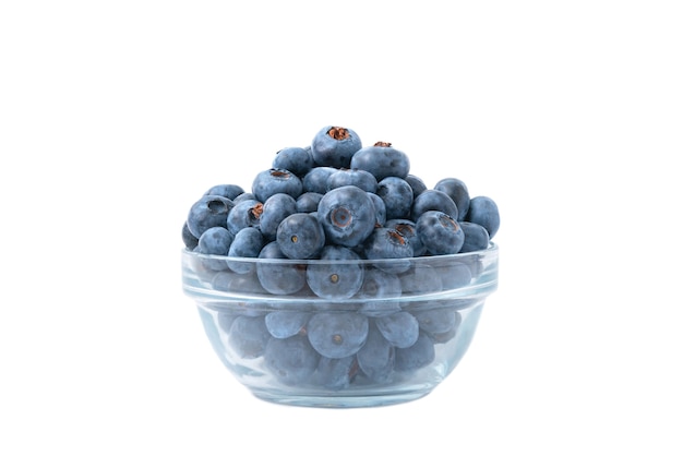 Close up of bowl full of blueberries isolated on white background. Healthy food.