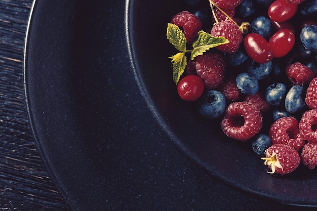 Close up of bowl full with fresh organic berries