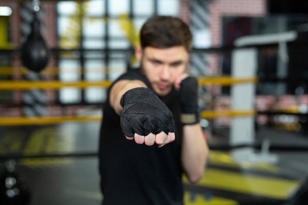 Close-up of the boxer's hand is ready to fight.