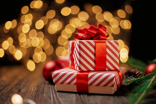 Close-up. boxes with gifts on the background of Christmas lights. photo with a copy-space.