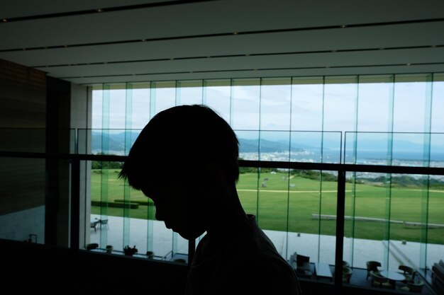 Photo close-up of boy at airport