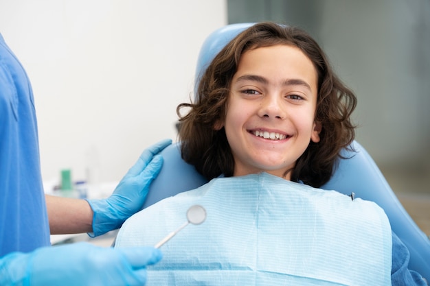 close up on boy at the dentist