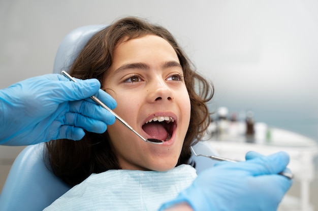 Photo close up on boy at the dentist