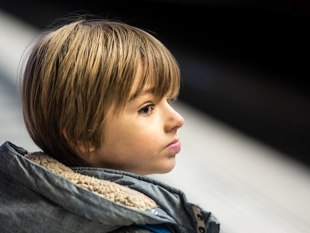 Close up of boy looking away