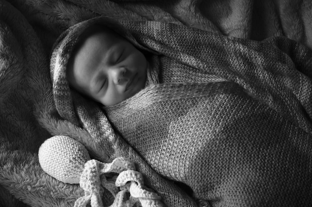 Photo close-up of a boy sleeping in bed