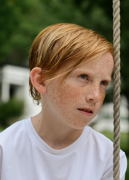 close-up of boy with freckles