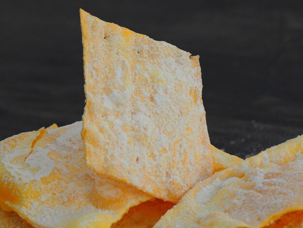 Close-up of bread against black background