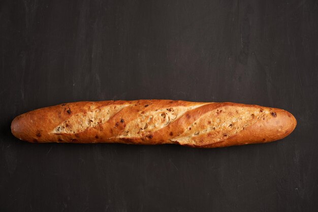 Close-up of bread against black background