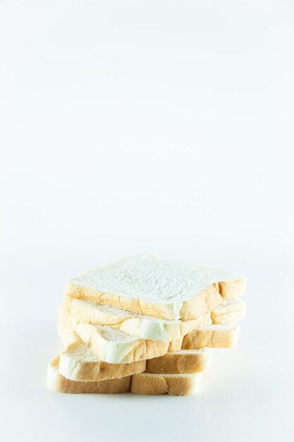 Close-up of bread against white background