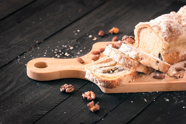 Close-up of bread on cutting board over table