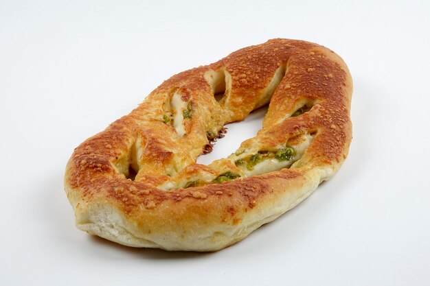 Photo close-up of bread over white background