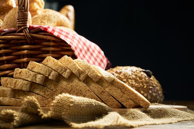 close-up of breads against black background