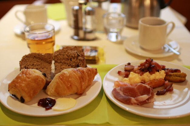 Close-up of breakfast served on table